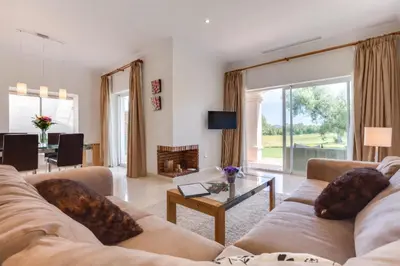 a living room with a couch and a table at Villa 231 by Villamya in Arcos de la Frontera