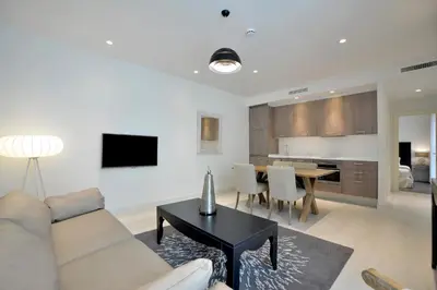 a living room with a couch and a table at El Armador Casa Palacio by Luxury Suites Cádiz in Cádiz