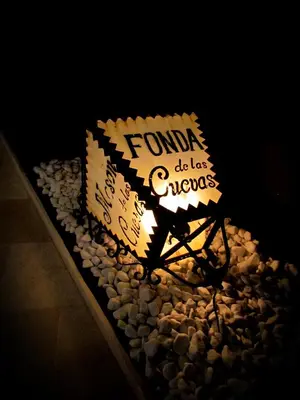 a cake that says foundana do last cheynes on rocks at Hotel Posada de las Cuevas in Arcos de la Frontera