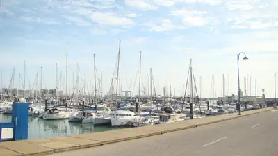 a bunch of boats docked in a harbor at Apartamento Medina Puerto Sherry in El Puerto de Santa María
