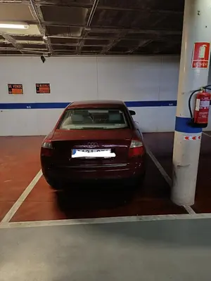 a car parked in a parking lot in a garage at Villablanca Apartamento in Chipiona