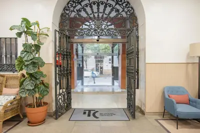 an entrance to a building with an iron gate at Itaca Jerez by Soho Boutique in Jerez de la Frontera