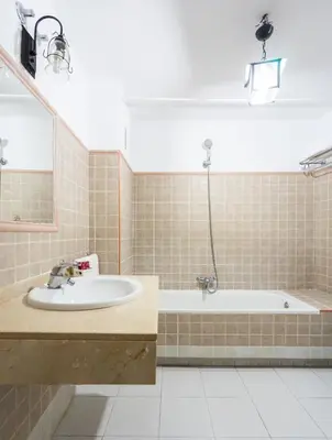 a bathroom with a sink and a bath tub at Hotel Marqués de Torresoto by Vivere Stays in Arcos de la Frontera