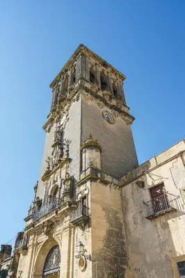 a tall clock tower on top of a building at Hotel Marqués de Torresoto by Vivere Stays in Arcos de la Frontera
