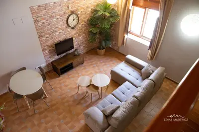 an overhead view of a living room with a couch and a fireplace at Jerez Centro MRZ Rentals in Jerez de la Frontera
