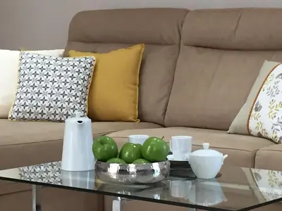a coffee table with a bowl of green apples on it at Apartamento San Pedro in Cádiz