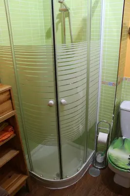 a shower with glass doors in a bathroom at Apartamento La Venencia in Jerez de la Frontera