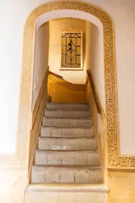 a stairway with a window and a stair case at Casa Seven Jerez in Jerez de la Frontera