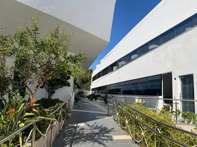 an external view of a building with plants at Ancla Real Apartamentos Loft in El Puerto de Santa María