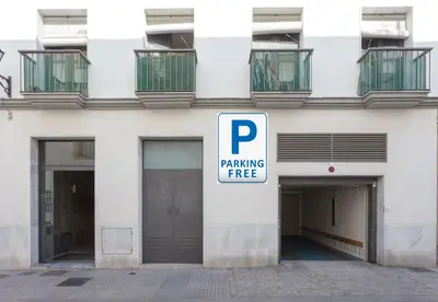 a parking free sign in front of a building at Apartamento La PALMA free parking by Cadiz4Rentals in Cádiz