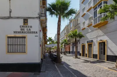 a street in a city with palm trees at Apartamento La PALMA free parking by Cadiz4Rentals in Cádiz