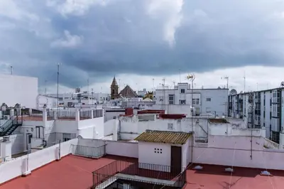 a view of a city from the roof of a building at Apartamento PUERTA-CALETA by Cadiz4Rentals in Cádiz