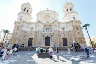 a group of people standing in front of a church at El Atico de las MARINAS free Parking by Cadiz4Rentals in Cádiz