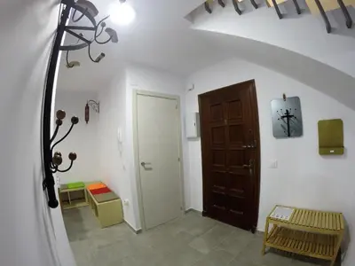 a room with a hallway with a door and a staircase at PASACALLES Home by Cadiz4Rentals in Cádiz