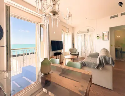 a living room with a view of the ocean at Balcón al Mar con Ascensor Grupo AC Gestion in Cádiz