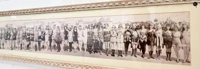 a painting of a group of people on a wall at Balcón al Mar con Ascensor Grupo AC Gestion in Cádiz