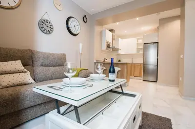 a living room with a couch and a table at Sagasta 13 in Cádiz