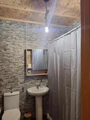 a bathroom with a sink and a toilet and a shower at Los Duendes in El Puerto de Santa María