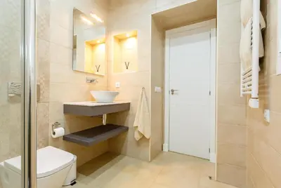 a bathroom with a sink and a toilet at El Patio in Cádiz
