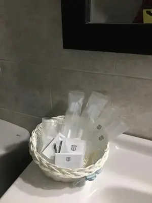 a basket sitting on top of a counter with some packets at Chalet La Primera Piedra in Conil de la Frontera