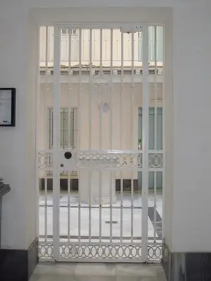 a door with a view of a building at Botic4 in Cádiz