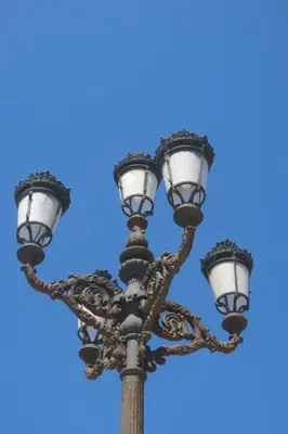 a street light with five lights on it at Botic4 in Cádiz
