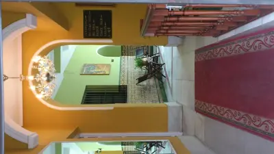a view of a room with a staircase in a building at Al Andalus Jerez in Jerez de la Frontera