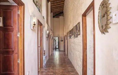 an empty hallway of a building with a hallwayngth at Jerez Viña Santa Petronila in Jerez de la Frontera