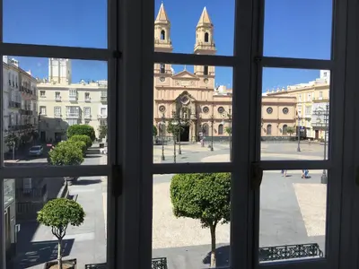 a view of a city from a window at Casa Bugambilla Cadiz in Cádiz