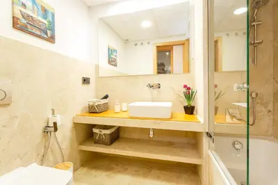a bathroom with a sink and a shower at Apartamento El SABIO by Cadiz4Rentals in Cádiz