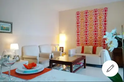 a living room with a couch and a table at Piso Ribera del Marisco in El Puerto de Santa María