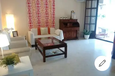 a living room with a couch and a coffee table at Piso Ribera del Marisco in El Puerto de Santa María