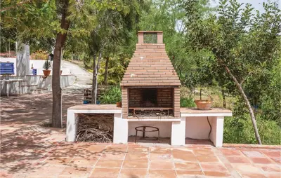 a dog house sitting on top of a patio at Beautiful Home In Arcos De La Frontera in Arcos de la Frontera