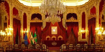 a large room with a chandelier in a building at Estudio Deluxe Playa de la Victoria in Cádiz