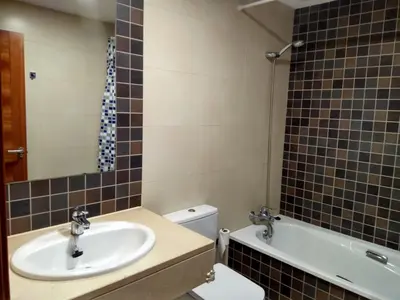 a bathroom with a sink and a toilet and a tub at Apartamento La Ermita Wifi in Jerez de la Frontera