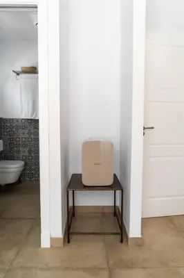 a box sitting on a table in a bathroom at Moorea Boutique - Only Adults in Chiclana de la Frontera