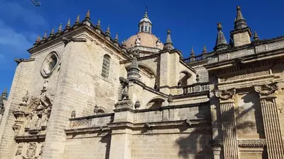 a building with a clock tower on top of it at Apartamento con Vistas al González Byass in Jerez de la Frontera