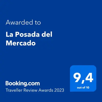 a screenshot of a cell phone with the text awarded to la pazda del at La Posada del Mercado in Cádiz