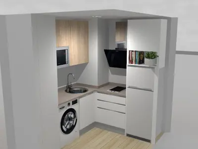 a small kitchen with white cabinets and a sink at Apartamento Valdelagrana in El Puerto de Santa María