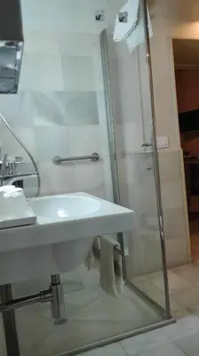 a bathroom with a sink and a shower at Estudio Bizcocheros in Jerez de la Frontera