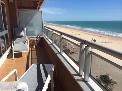 a balcony with a view of the beach at Luxury Oceanfront triplex in Cadiz in Cádiz