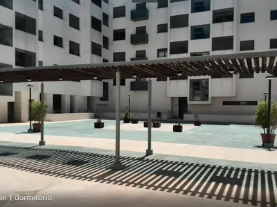 a large building with awning in front of it at estudio santa maria in El Puerto de Santa María