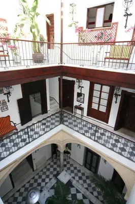 an overhead view of a building with a spiral staircase at Hostal Palacio San Bartolomé in El Puerto de Santa María