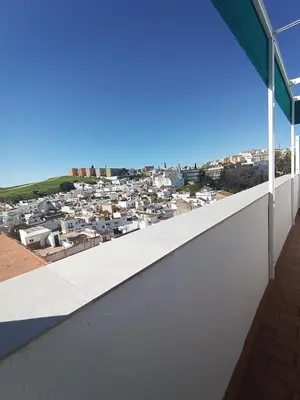 a view of a city from the roof of a building at Atiko La Vista in Arcos de la Frontera