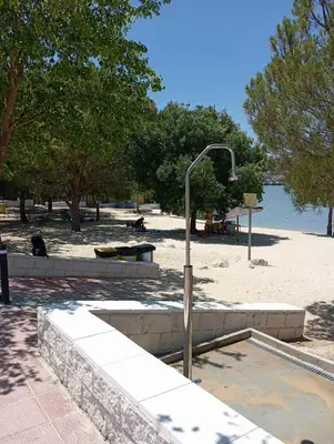 a street light in a park next to a beach at Atiko La Vista in Arcos de la Frontera
