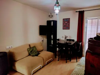 a living room with a couch and a table at Casa Salvadora in Algar