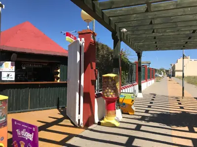 a building with a playground with a store at Casa Bahía de Cádiz in Puerto Real