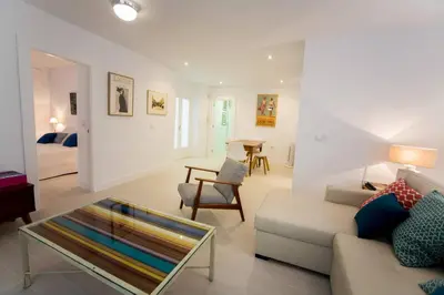 a living room with a couch and a table at Apartamento Rosario 49 in Cádiz