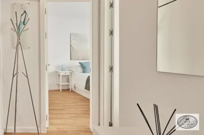 a hallway with a door leading to a bedroom at Dulce Arbolí Little Apartments in Cádiz