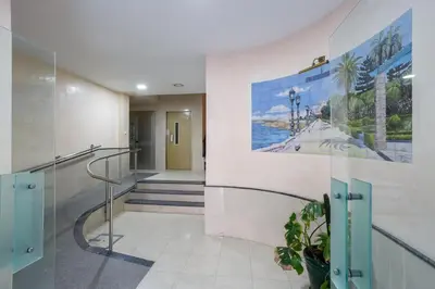a hallway in a building with a painting on the wall at Atico FULL Balcony by Cadiz4Rentals in Cádiz
